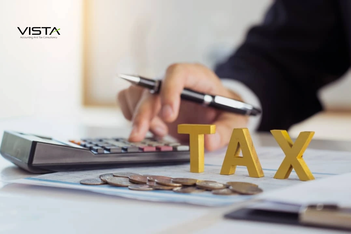 man planning tax for business